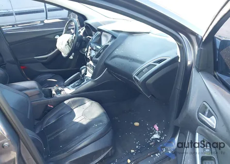 2012 Ford Focus Titanium z USA, uszkodzony, nr VIN 1FAHP3J20CL369708